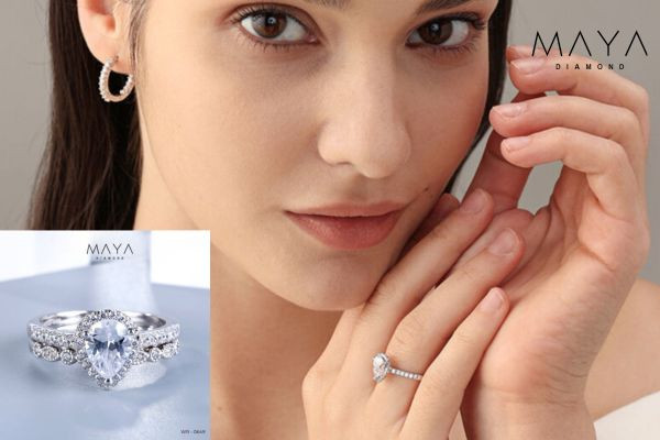 Nhẫn kim cương viên chủ Pear 3 carat phối full band vàng trắng 18K